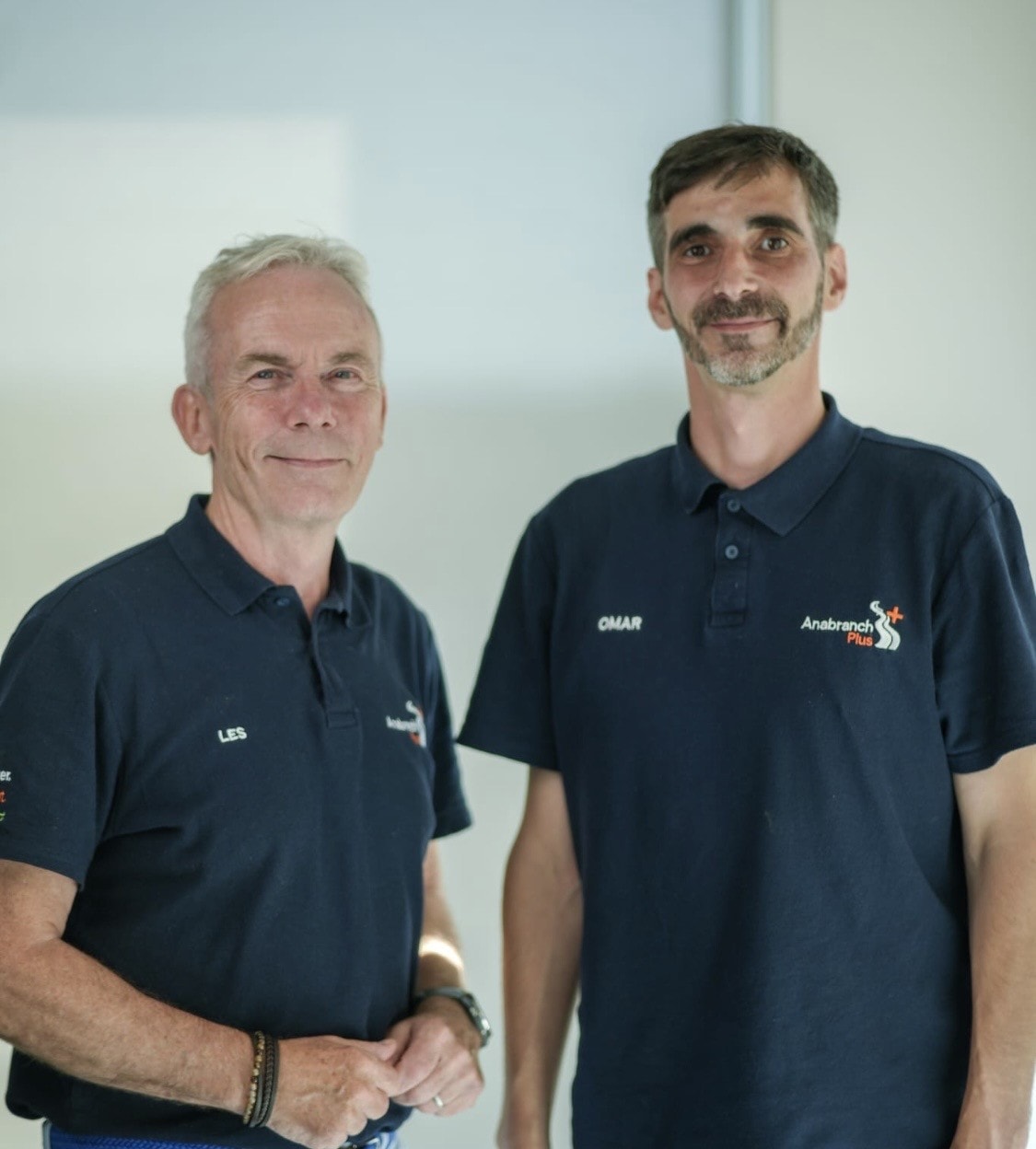 Omar Mentesh and Les Gill wearing Anabranch Plus polo shirts